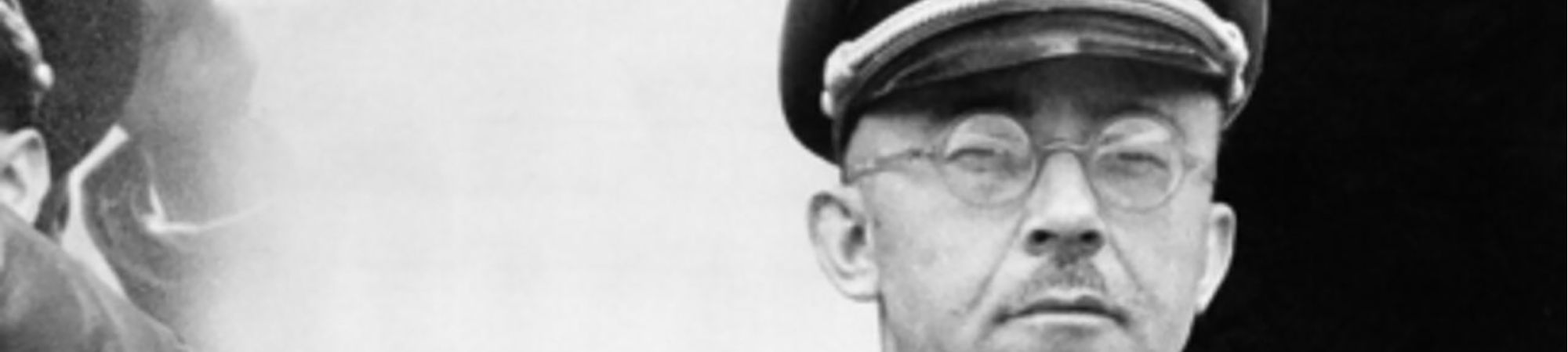 FILE - The undated file photo shows German Nazi party official and head of the SS, Heinrich Himmler. at unknown location in Germany. German newspaper Welt am Sonntag has published a trove of letters believed to be written by Nazi SS leader Heinrich Himmler. On seven full pages the paper on Sunday Jan. 26,2014  showed pictures of Himmler and his family smiling into the camera during a fishing trip, the top Nazi taking a bath in a lake or feeding a little fawn. The newspaper, which says the material is contained in an eight-part series it plans to publish, also quotes excerpts from Himmler's love letters addressing his wife as "my sweet, beloved little woman." Welt said it worked together with Israeli film director Vanessa Lapa, whose family had the documents in its possession.  (AP Photo/str/file)/XHM101/583268723719/UNDATED B/W FILE PHOTO/1401261246